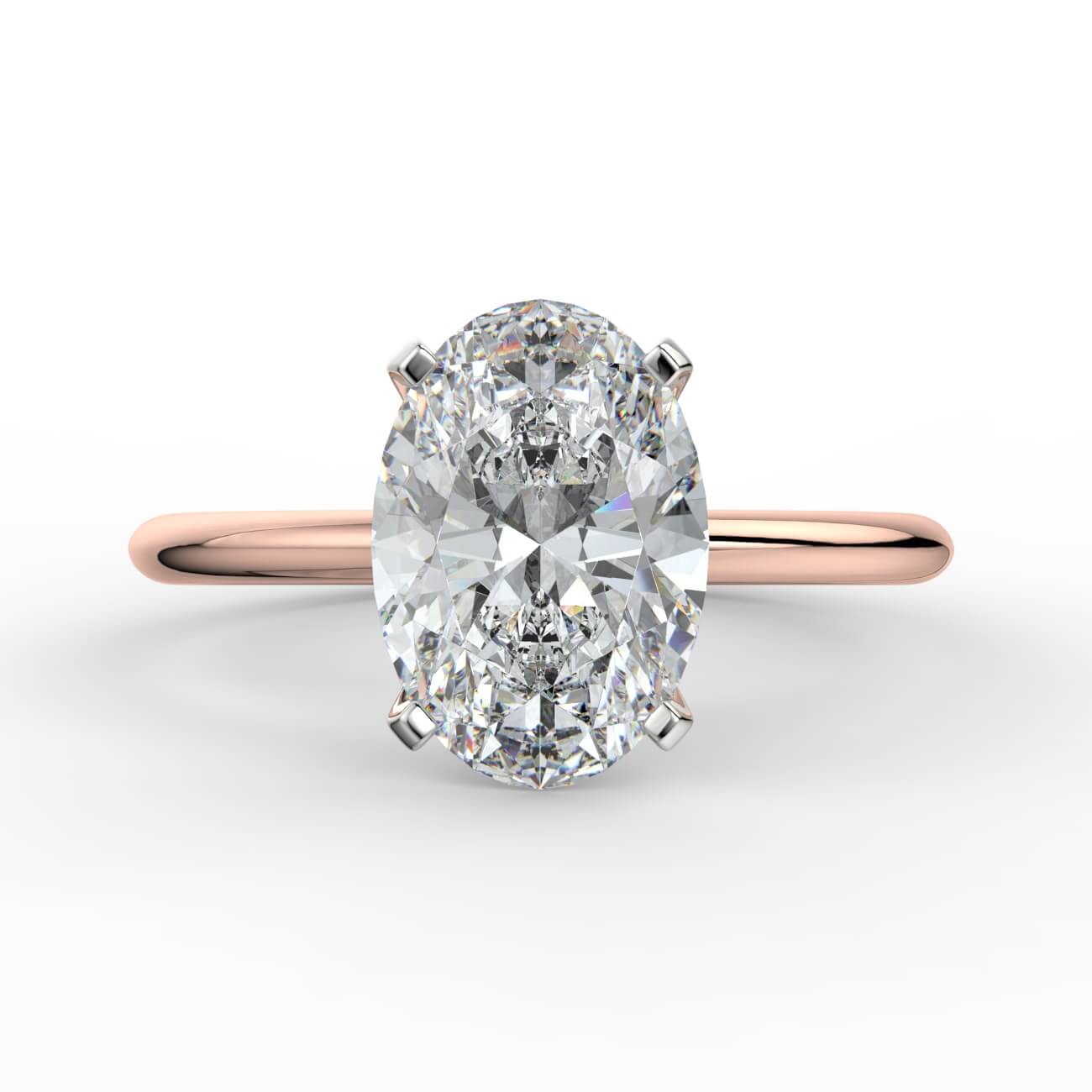 oval shape diamond solitaire ring in white and rose gold - Australian Diamond Network
