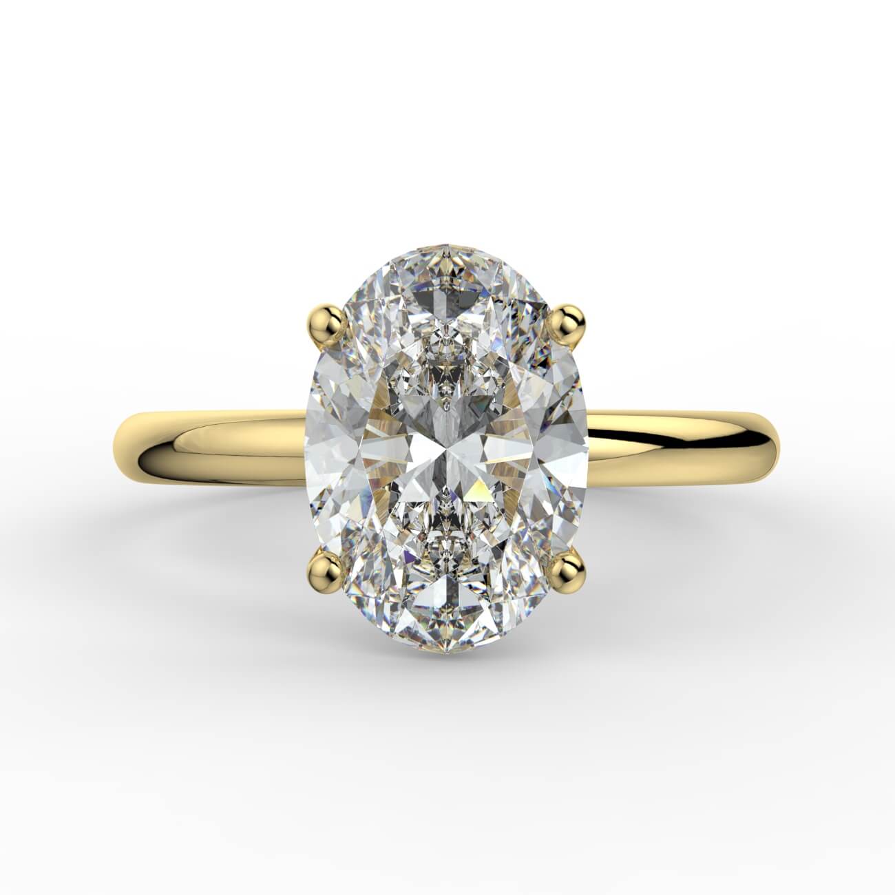Solitaire oval diamond engagement ring in yellow gold – Australian Diamond Network