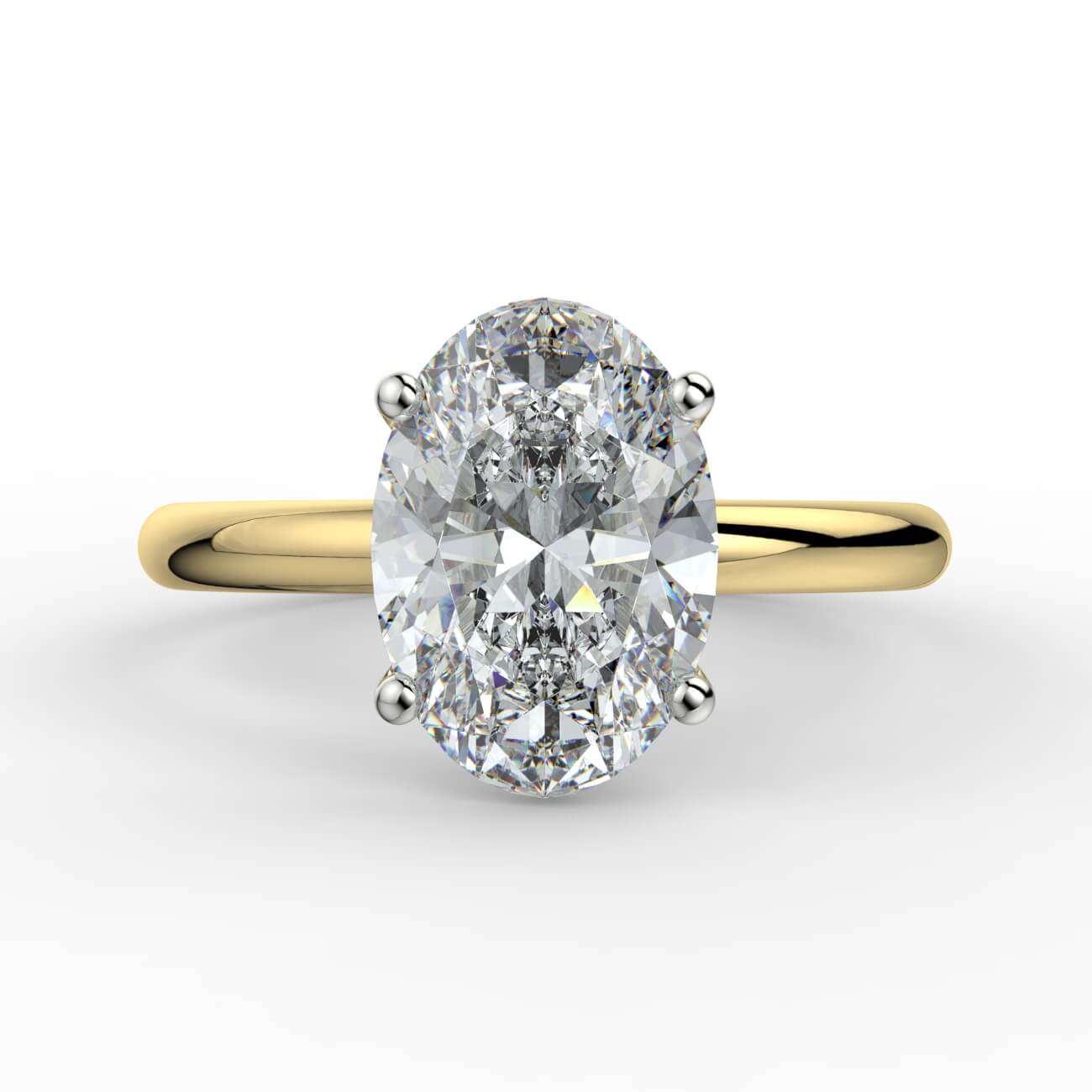 Solitaire oval diamond engagement ring in white and yellow gold – Australian Diamond Network