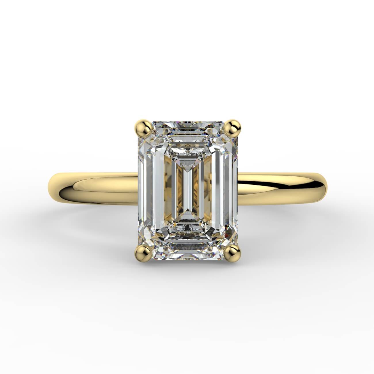 Solitaire emerald cut diamond engagement ring in yellow gold – Australian Diamond Network