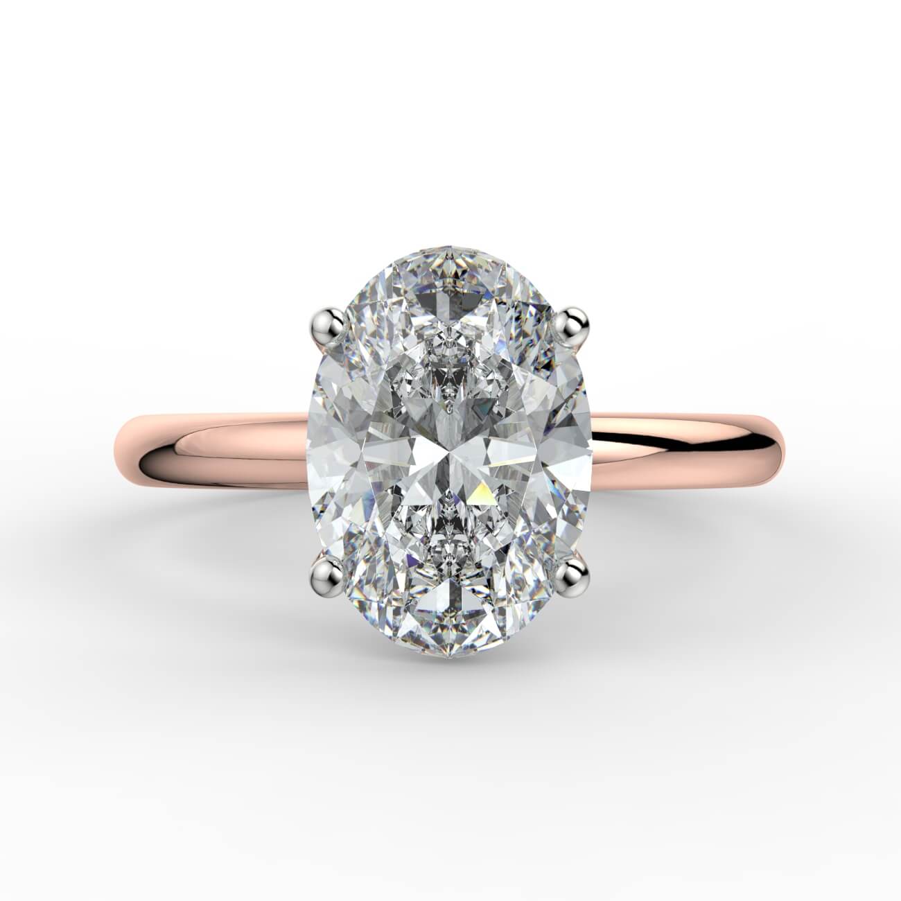 Solitaire oval diamond engagement ring in rose and white gold – Australian Diamond Network