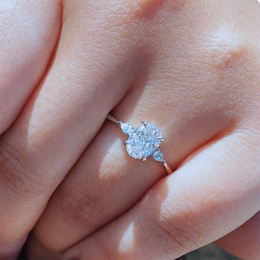 Oval Shape Diamond Ring With Pear Shape Side Diamonds in white gold – Australian Diamond Network