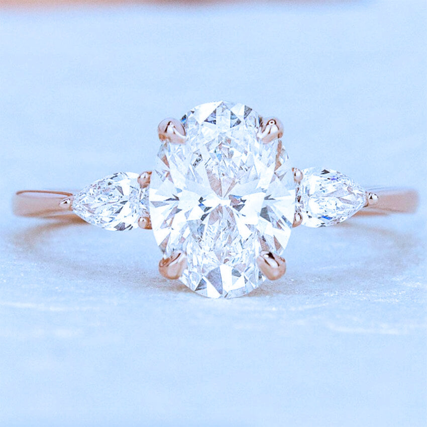 Three Stone Oval Shape Diamond Engagement Ring With Pear Shape Side Stones - Australian Diamond Network
