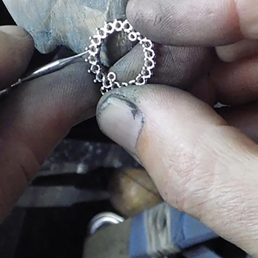 handcrafting circle diamond pendant in white gold - Australian Diamond Network